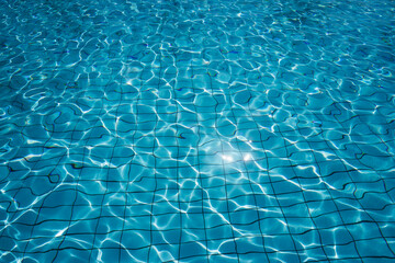Sunlight reflected in swimming pool, Apulia, Italy