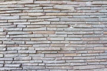 pattern of decorative white slate stone wall surface.