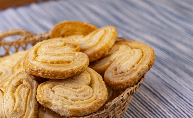Bakery delicious design from Elephant ear ,Palm leaves, Butterfly shape and Heart about Pies Puff pastry with butter and sugar on bowl, Palmier or Coeur de France