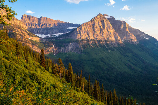 Mount Oberlin And Clements With Bird Woman Falls on Montana summer day