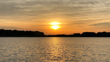 Fototapeta na wymiar sunrise over the lake while kayaking