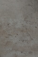 Grey stone surface as background, closeup view