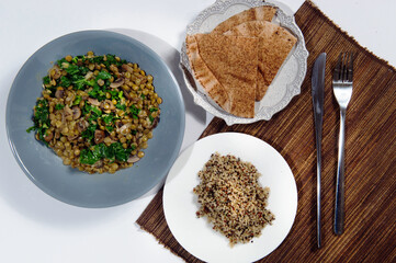 Raw ingredients. Ready to be cooked. Recipe for chiken stew, European cuisine, cooked with a garnish of mushrooms, small onions and ohter.