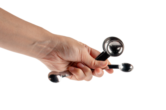 Hand and measuring spoon on transparent background - Powered by Adobe