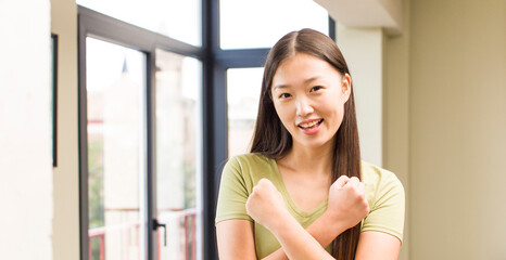 asian pretty woman at home with big windows background