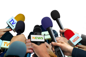 Hands holding microphones during press interview