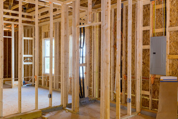 Framing beams in residential construction house frame an unfinished wooden frame