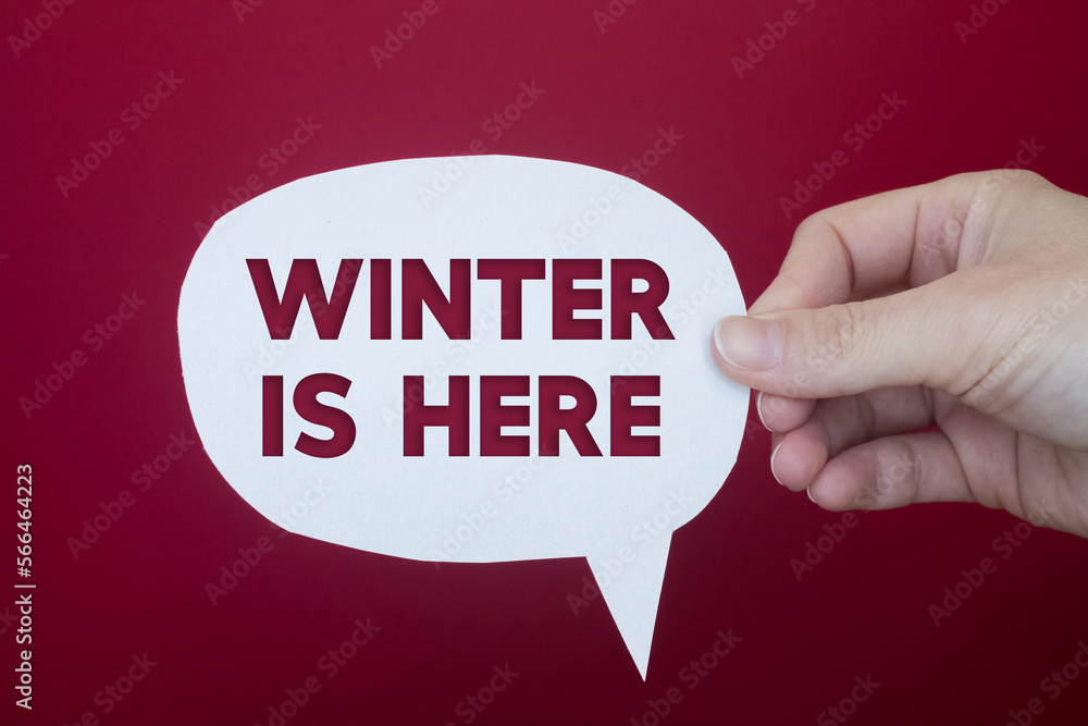 Poster speech bubble in front of colored background with winter is here text.