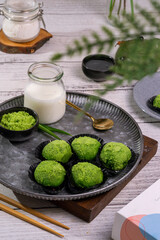 Mochi snacks are typical Japanese food, there are variants of green tea, strawberry, chocolate, cheese, green beans with the brightmood photo concept