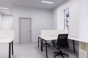 Naklejka na ściany i meble Empty office after renovation with new furniture
