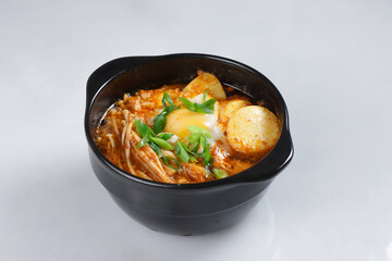 Sundubu JJigae is Korean Spicy Soft Tofu Stew.