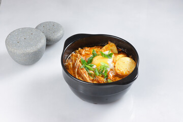 Sundubu JJigae is Korean Spicy Soft Tofu Stew.