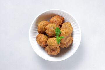 Cekodok Pisang is a traditional Malay fritter snack made from Banana, other name is jemput-jemput or Cucur Pisang.