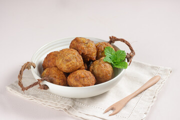 Cekodok Pisang is a traditional Malay fritter snack made from Banana, other name is jemput-jemput or Cucur Pisang.