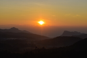 Scenery top view of the mountains in an early morning in Tambon Ban Pae, Chiang Mai, Thailand. December 2022.