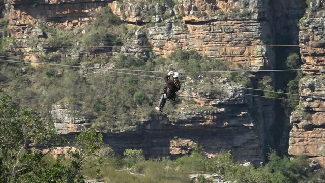 Unidentified girl glides on tall zipline in south africa
January,25,2023, South Africa, Lake Eland Game Reserve 
