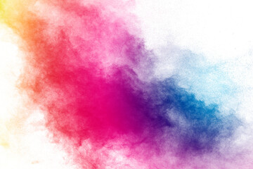 Fototapeta na wymiar Freeze motion of color powder exploding on white background.