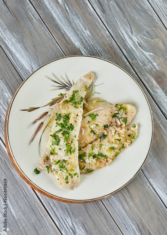 Sticker Barcy-style perch on plate. French gourmet cuisine