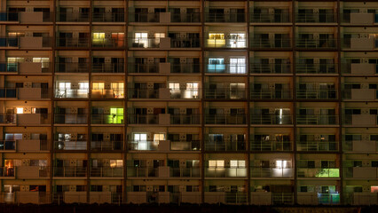 Japanese apartment building at night.