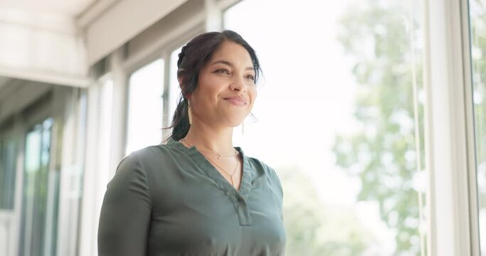 Walking, business woman and office employee in a company building corridor ready for work. Walk, smile and happy tech startup worker in the morning thinking about working mission and career strategy