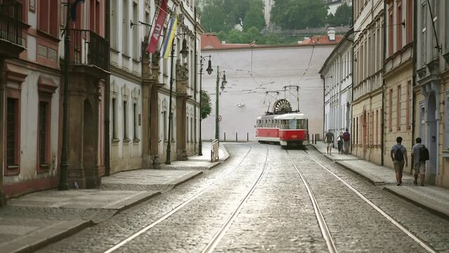 Prague tram trolley streetcar. Downtown historic rail Czech Republic. Tourist attraction landmark, travel destination in Europe.
