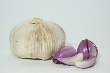 big garlic and red onion isolated on white background