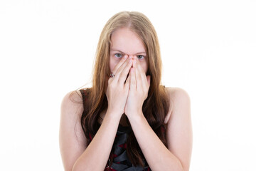 disgusted scared woman with hands on surprised face on white background
