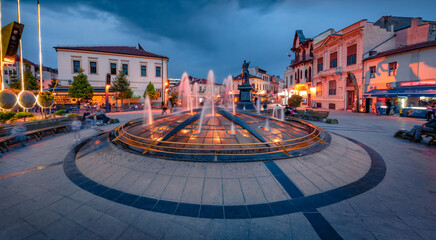 Dramatic evening scene of fountain in Central Park of Bitola city. Vacation in North Macedonia; Europe. Traveling concept background.