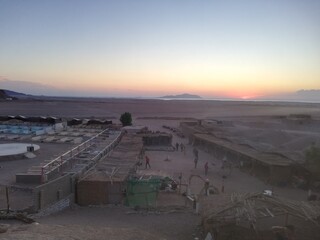 A beautiful sunrise in Sinai Desert, Egypt at safari camp during safari trip