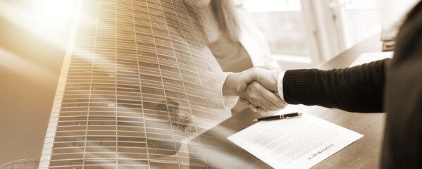 Hanshake of business people (lorem ipsum text used); multiple exposure