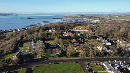 Village Charlestown and Firth of Forth view from the sky.  Charlestown is a village in Fife, Scotland. It lies on the north shore of the Firth of Forth