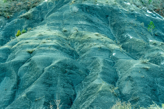 Typical geological formation called robine in French (no exact translation). Hill made of black marls (limestones and clay), ravines and gullies. La Robine-sur-Galabre, Alpes-de-Haute-Provence, France