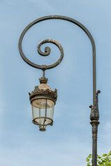 Fototapeta na wymiar Ornate lantern lamp at Place des Vosges, Paris, France
