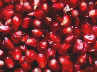 Garnet background. The texture of pomegranate seeds.