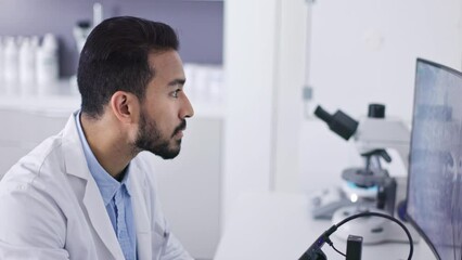 Science, research study and man with biotechnology and scientific tech, innovation and scientist with data analysis in lab. Study, doctor runs experiment and check sample, review results on monitor