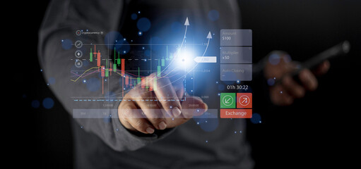 Planning and strategy stock business growth progress or success idea. Businessman or trader’s hand showing graph of browning hologram stock on virtual screen