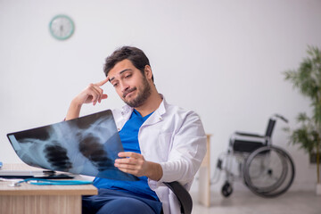 Young male doctor radiologist working in the clinic