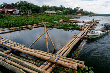 Fototapeta na wymiar spots for fishing are made of bamboo that has been arranged, local residents usually fish here
