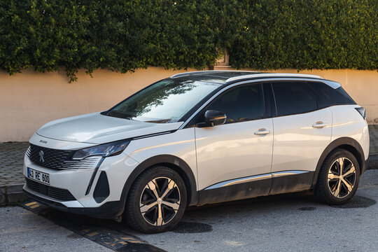 Side, Turkey – january 23 2023:   white Peugeot 3008   is parked  on the street on a warm day