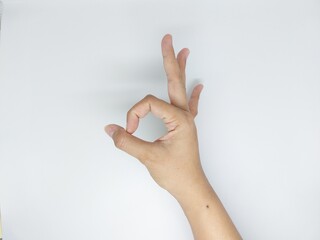 Hand ok sign isolated on white background