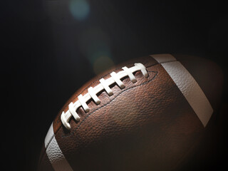 Ball for American football on a black background. USA game. Copy space.