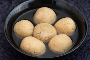 Indian Mithai Gurer Rosogolla Also Called Rasgulla, Rasagola, Rosgola, Roshogolla, Rossogolla, Rasbhari Or Rasbari Is Ball Shaped Dumpling Made Of Chhena, Sugar Syrup, Gud, Chena, Panir, Paneer, Gur