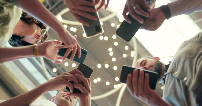 Low, connection and business people with phone for bluetooth, social media and communication. Planning, email and group of employees typing on a mobile for an app, chat and sync while networking