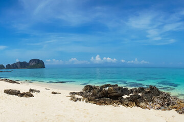 Obraz premium Tropical forest, sea coast, beach and sky. Phuket, Thailand. Traveling concept.