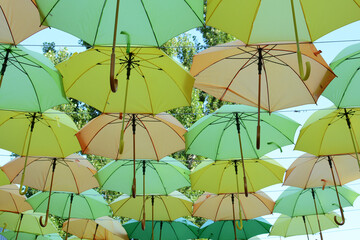 Fototapeta na wymiar The dеcor is made of multi-coloured umbrellas.