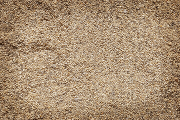 Seamless texture of brown stones or gravel