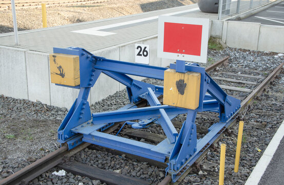 A buffer stop, also known as a buffer weir or buffer, is a form of track closure. It prevents a vehicle from rolling over the end of the track on dea