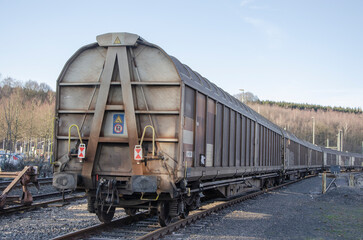 Old railway wagon on a track