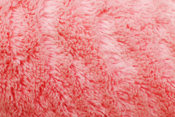 pink fluffy textile texture. Nappy hairy background closeup.