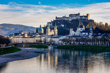 Fototapeta premium The River Salzach glitters in winter as it flows through Salzburg